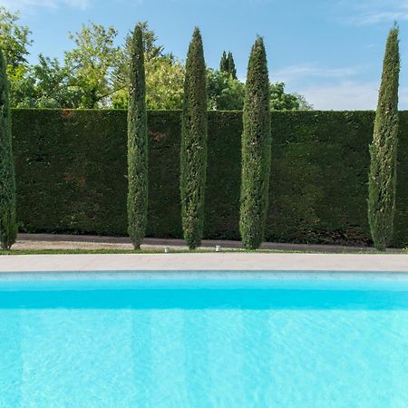 Villa Carini With 3000 Mq Garden & Heated Pool กัสเตลนูโอโว เดล การ์ดา ภายนอก รูปภาพ