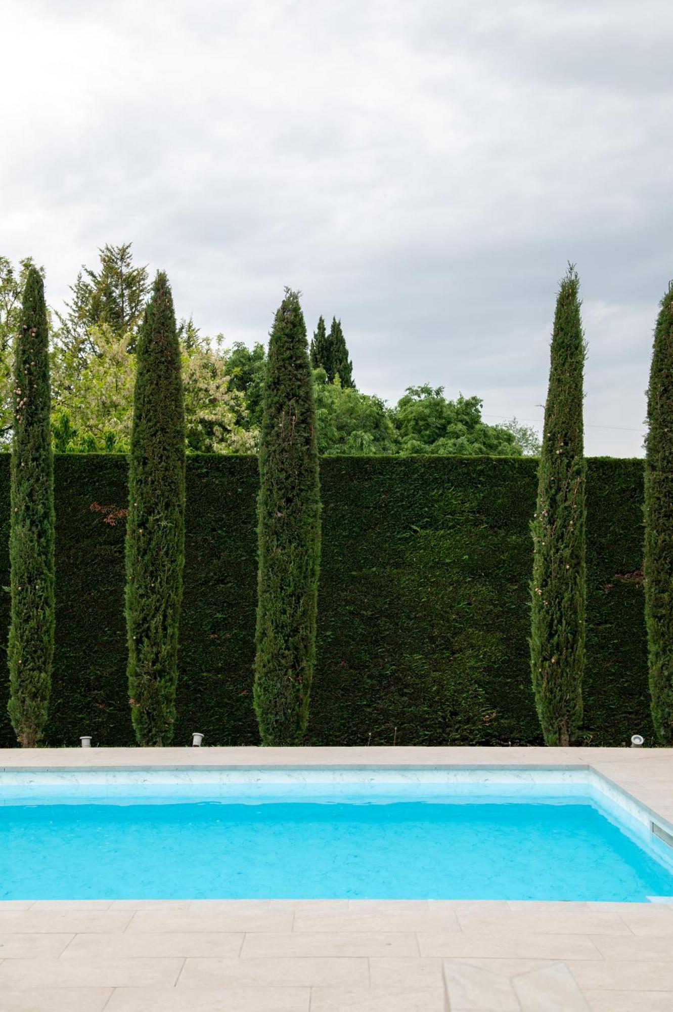 Villa Carini With 3000 Mq Garden & Heated Pool กัสเตลนูโอโว เดล การ์ดา ภายนอก รูปภาพ